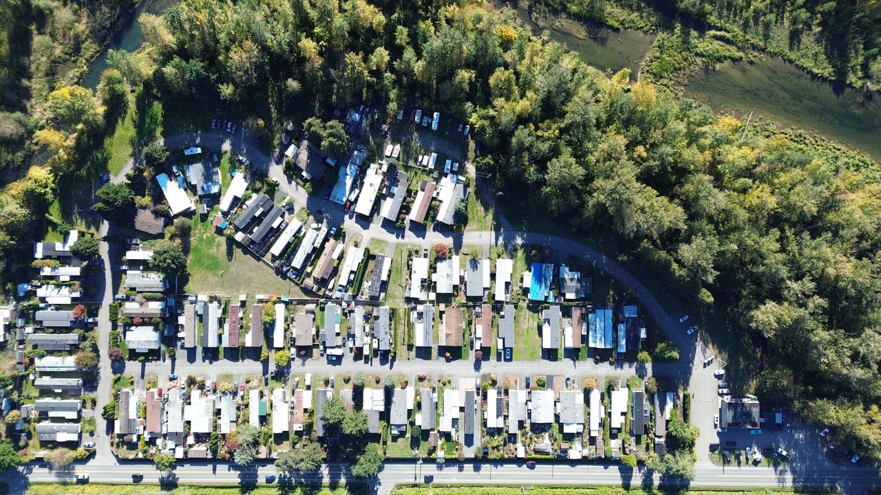 Aerial view straight down over Chilliwack River Estates, with Chilliwack Lake Road along the bottom and the Chilliwack River at the top