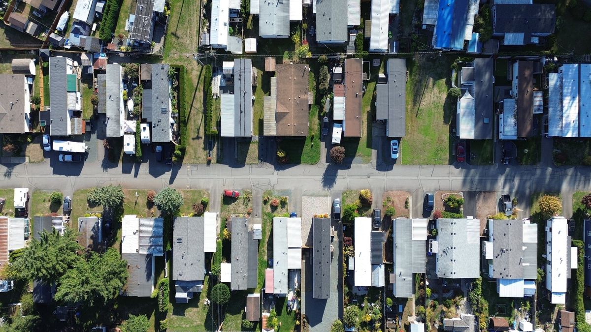 Aerial view straight down over rows of homes in the park